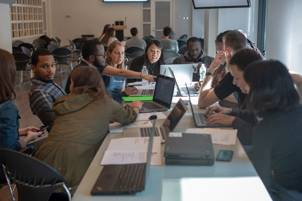 a group learns how to code