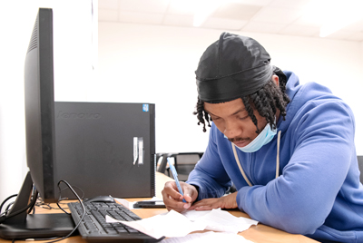 GOSO participant working at office