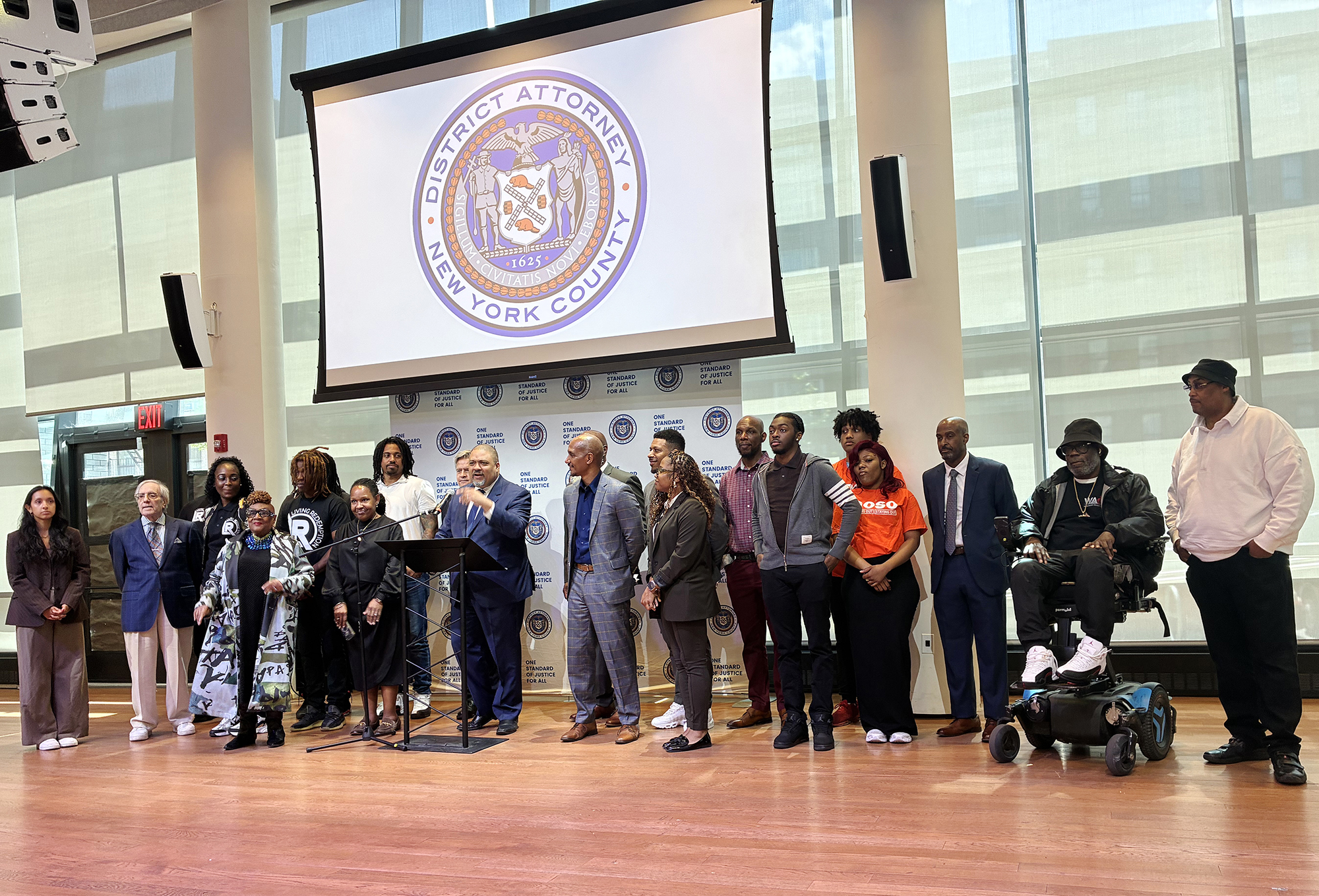 GOSO staff and other Cure Violence leaders with DA Bragg